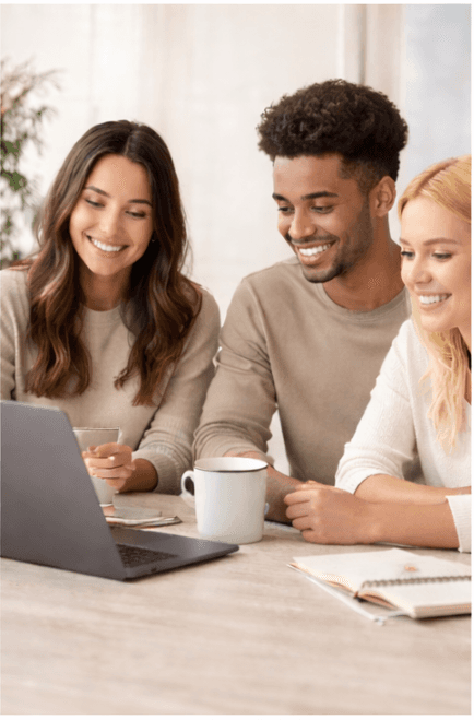 Guests planning together around a laptop